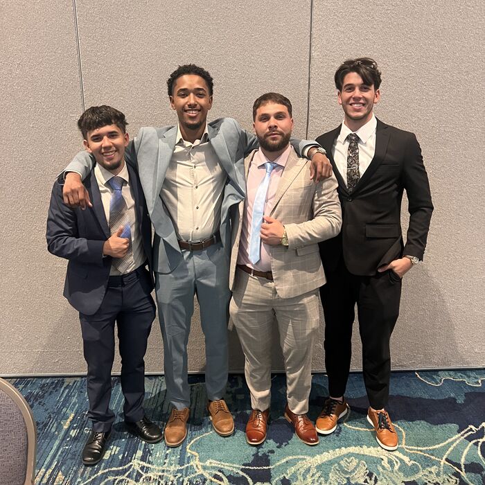 Capital Vision Enterprise team members celebrating at an event