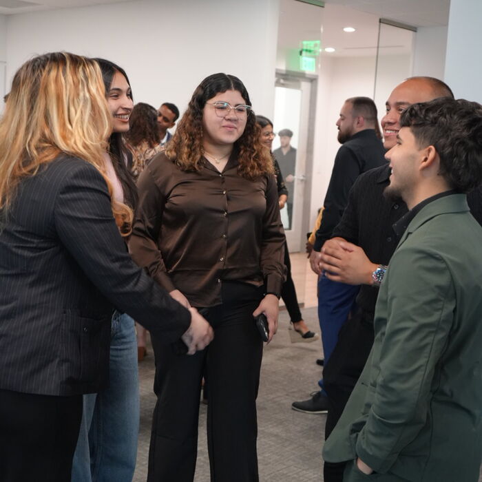 Capital Vision Enterprise team members networking at an event
